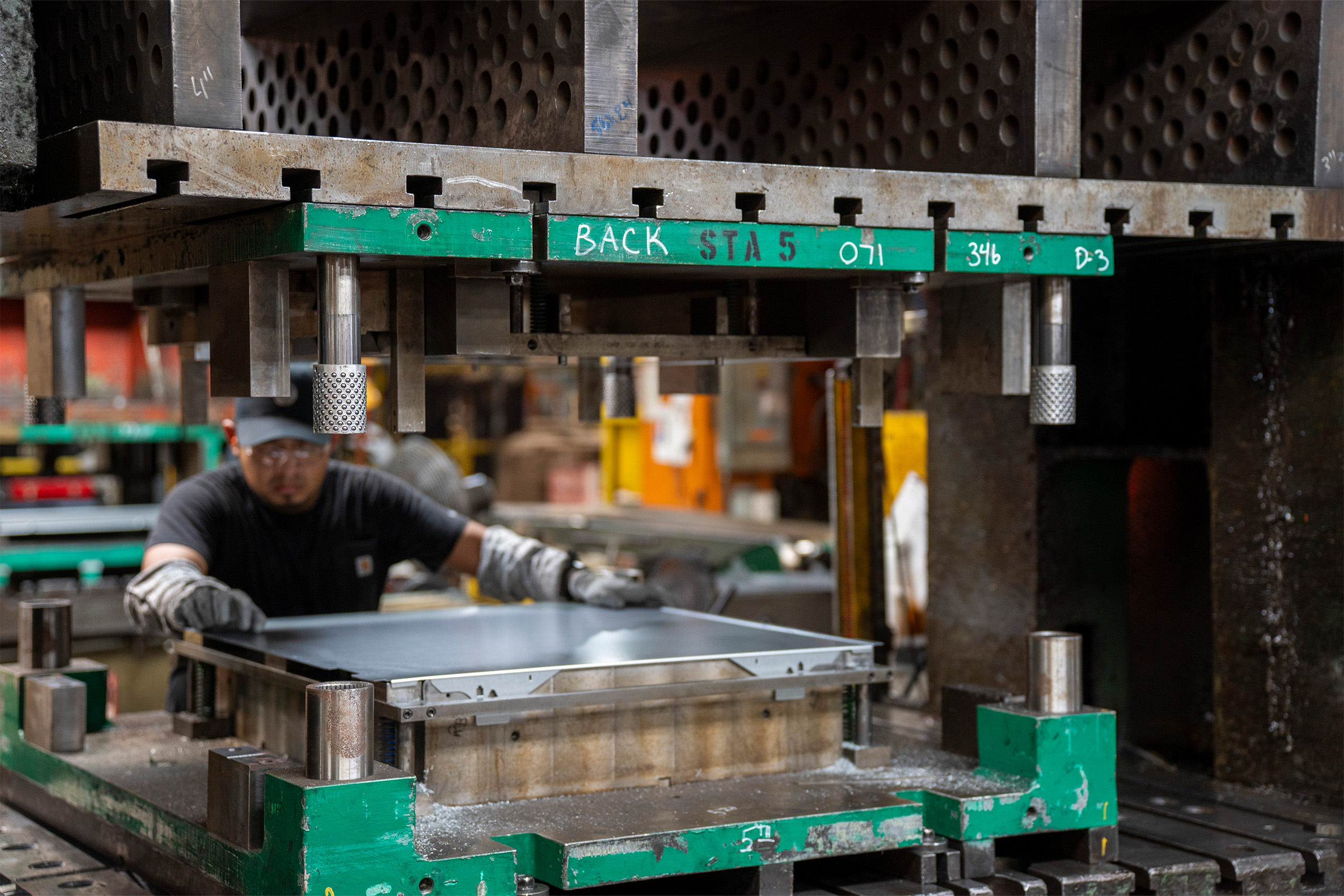 Hand transfer stamping process forming metal components
